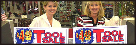 Women With Tool Sale Signs